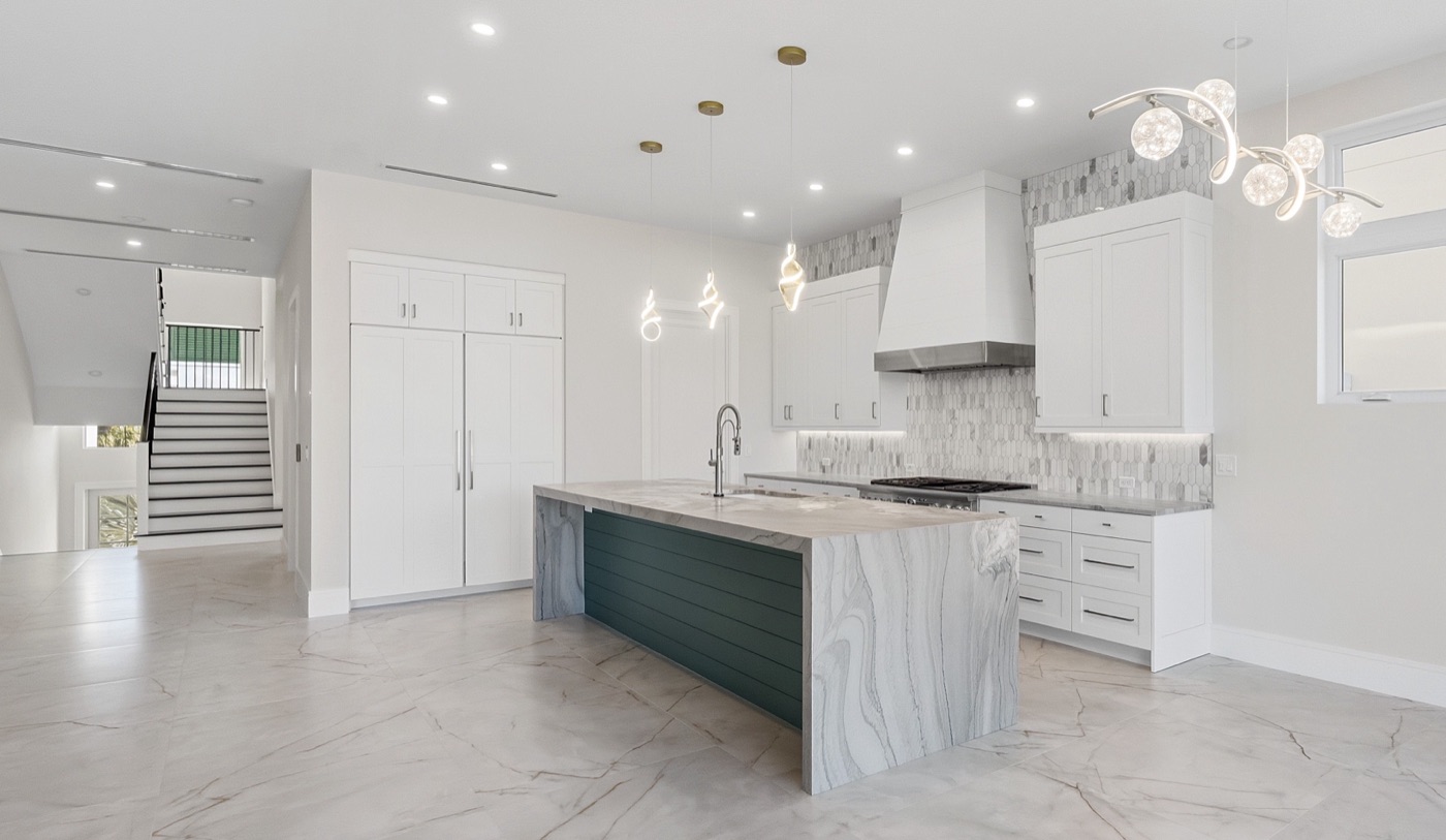Modern kitchen with forest-green island